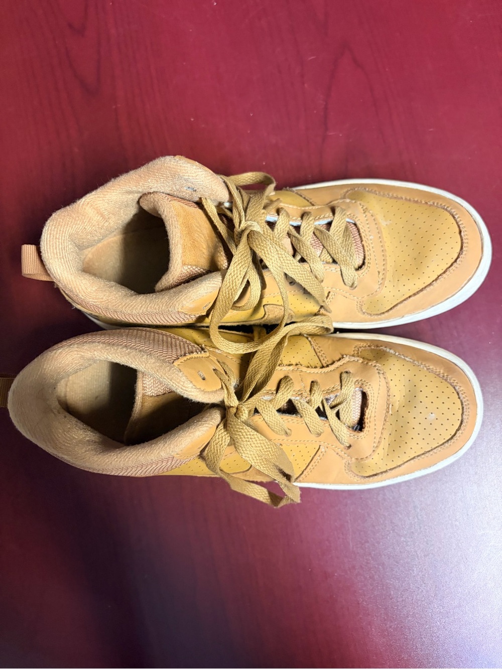 Nike men’s High-Top Sneakers in a tan/brown color